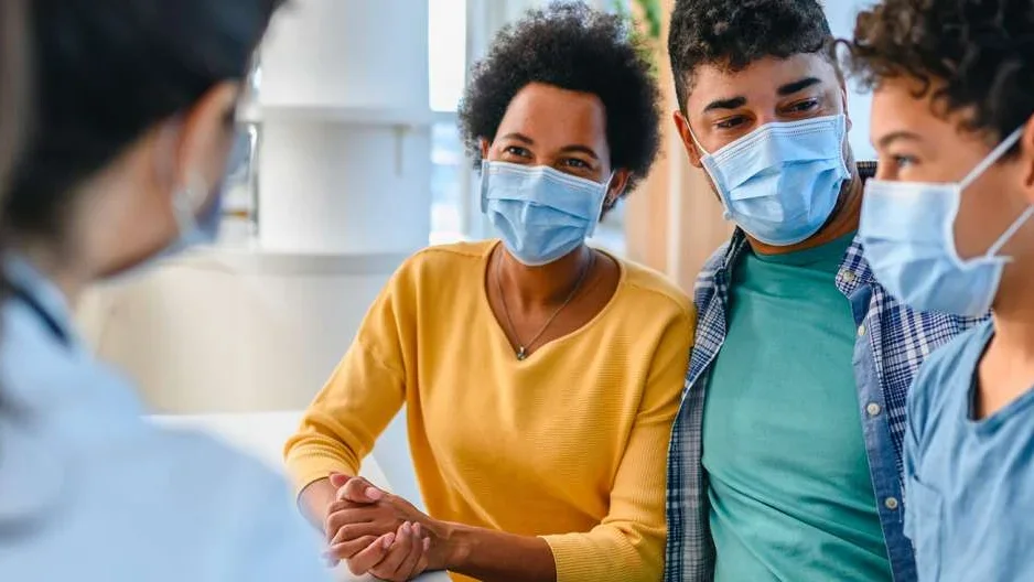 Family wearing masks