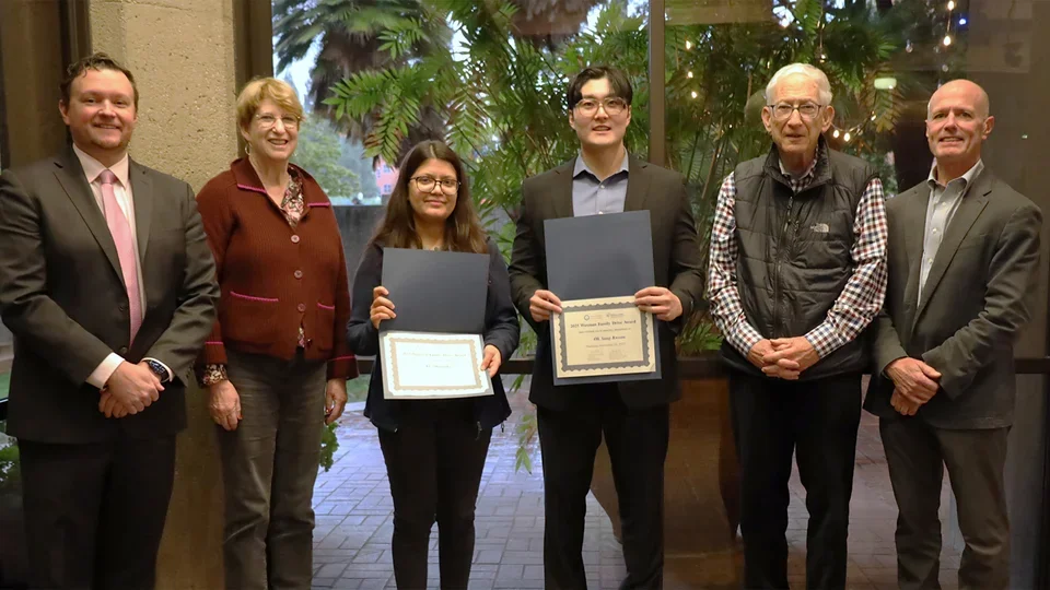 two award recipients smiling in a photo with two donors and members of faculty - for the 2025 Waxman Family Drive