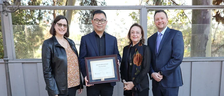 Congratulations to Dr. Chao Peng, Assistant Professor of Neurology at UCLA, for receiving the 2024 Turken Research Award! Photo: Ms. Heather Cooper Ortner (AlzLA), Dr. Chao Peng (2024 Turken Research Awardee), Ms. Beth Devermont (Turken donor), and Dr. Jason Hinman (Interim Co-Center Director).