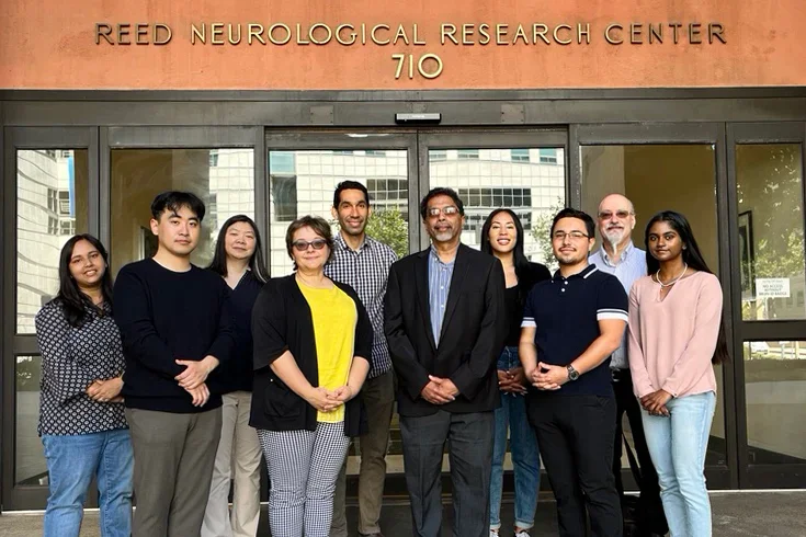 Drug Discovery Lab members outside of a building smiling for a group photo