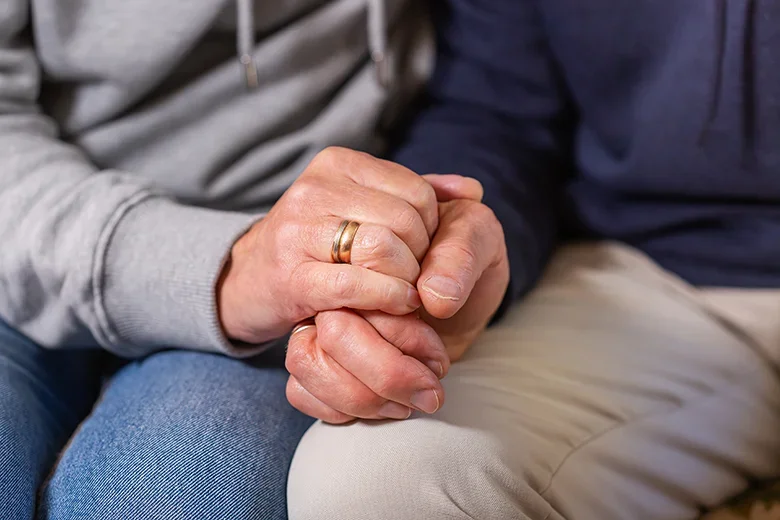 image-spouse-partner support-group-hand-holding