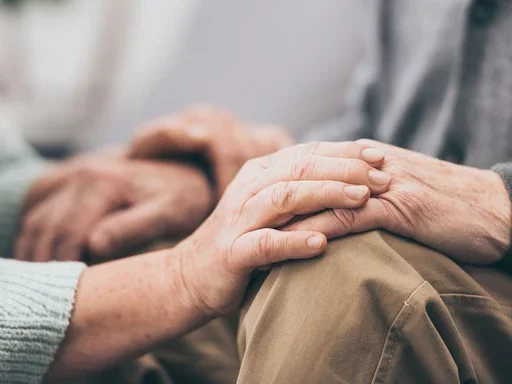 Lewy Body Dementia (LBD) Caregiver Support Group Elderly Person Being Comforted