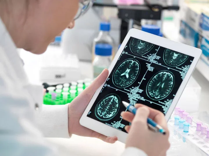Doctor viewing the patient chart on a tablet