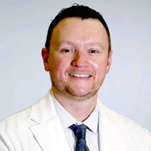 Jason Hinman MD PhD, Easton Center Director, male, smiling for professional profile.