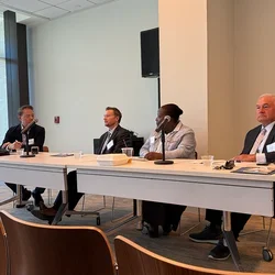 Four panelists at the breakout session discussing the science behind hypertension and dementia.