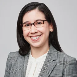 Alejandra Sánchez López, MD, female, smiling for professional portrait.