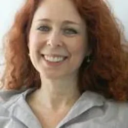 Jenny Brook, MS, female, smiling for professional profile.